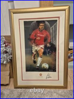 Eric Cantona framed/signed Manchester United photo- OFFICIAL SIGNATURE