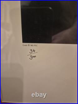 Eric Cantona framed/signed Manchester United photo- OFFICIAL SIGNATURE