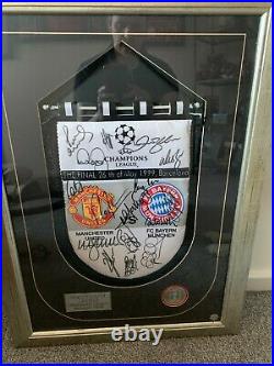 Frame and signed manchester united 1999 champioms league pennant coa