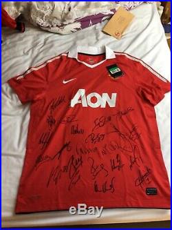 Manchester United 2010/11 Squad Signed Shirt. Club COA