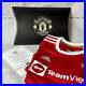 Manchester_United_2021_2022_Signed_Home_Shirt_Varane_MUFC_COA_01_crje