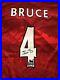 Manchester_United_Jersey_Signed_By_Steve_Bruce_01_dclg