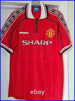 Manchester United football shirt 1999/2000 Treble winners, signed by 17 Beckham