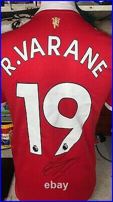 Raphael Varane Hand Signed Name And Number 21/22 Manchester United Home Shirt