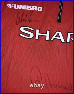 Signed Manchester United 1999 Treble Shirt. G Neville Cole Irwin Brown & May COA