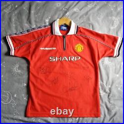 Signed Manchester United 1999 signed home boys jersey