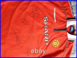 Signed Manchester United 1999 signed home boys jersey